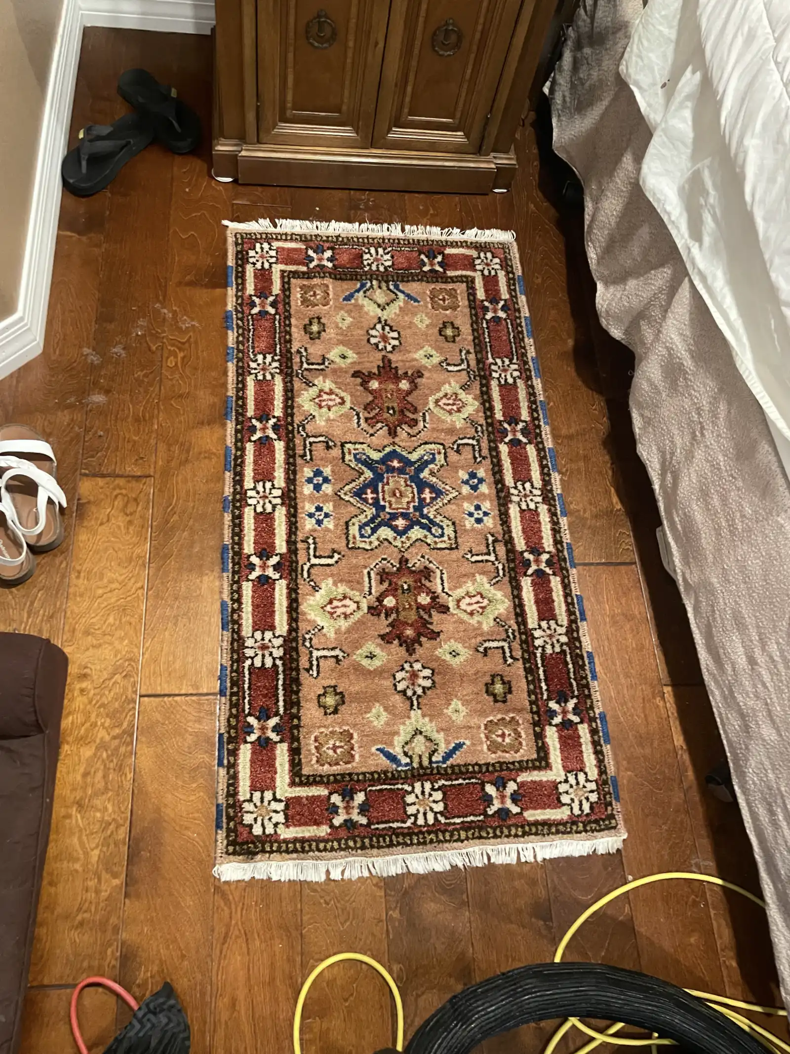 Before and after runner rug cleaning in north Peoria home showing dye transfer and edge curl issues addressed
