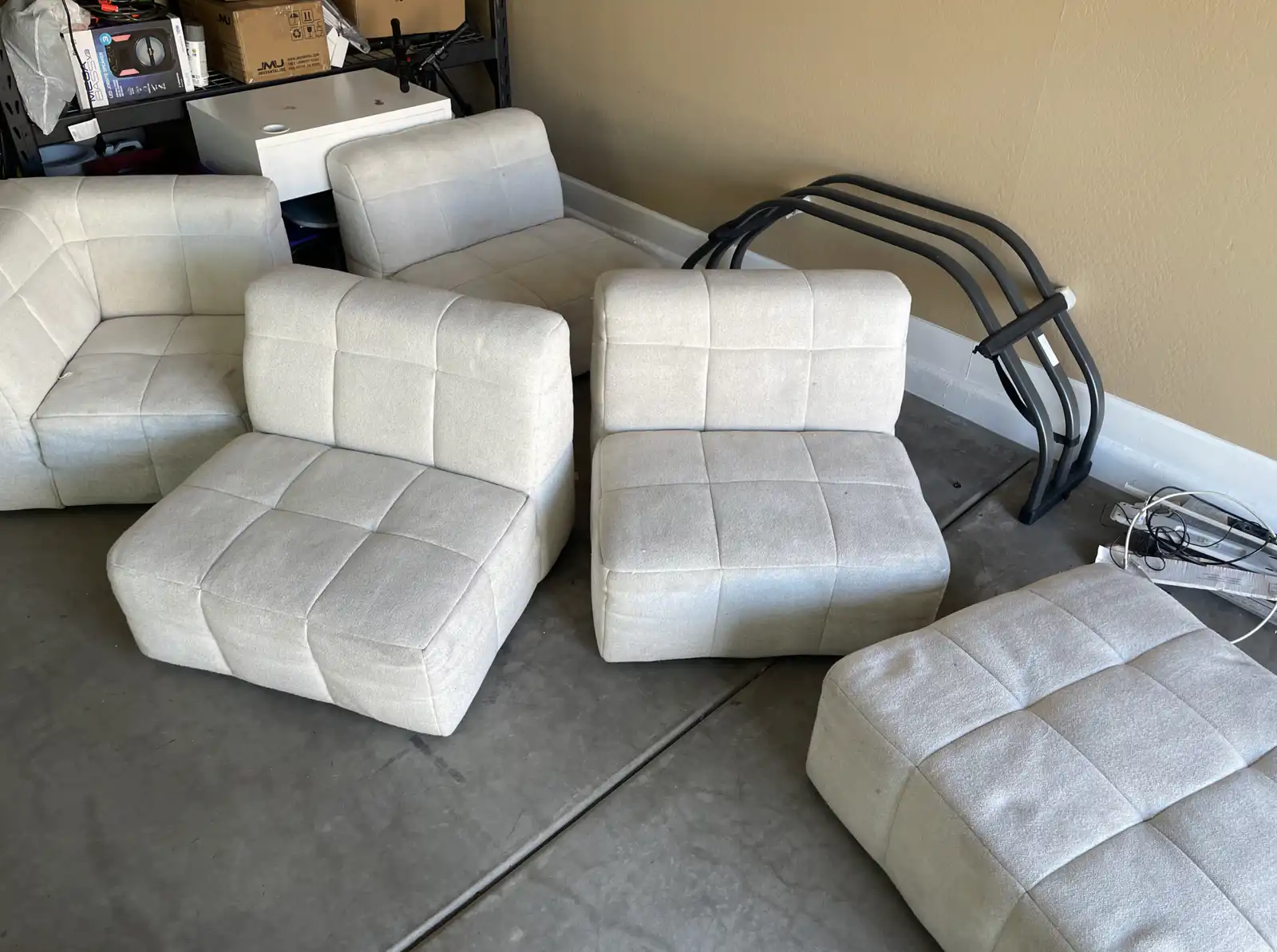 Before and after modular sectional cleaning in Youngtown garage showing dirt from moving vans