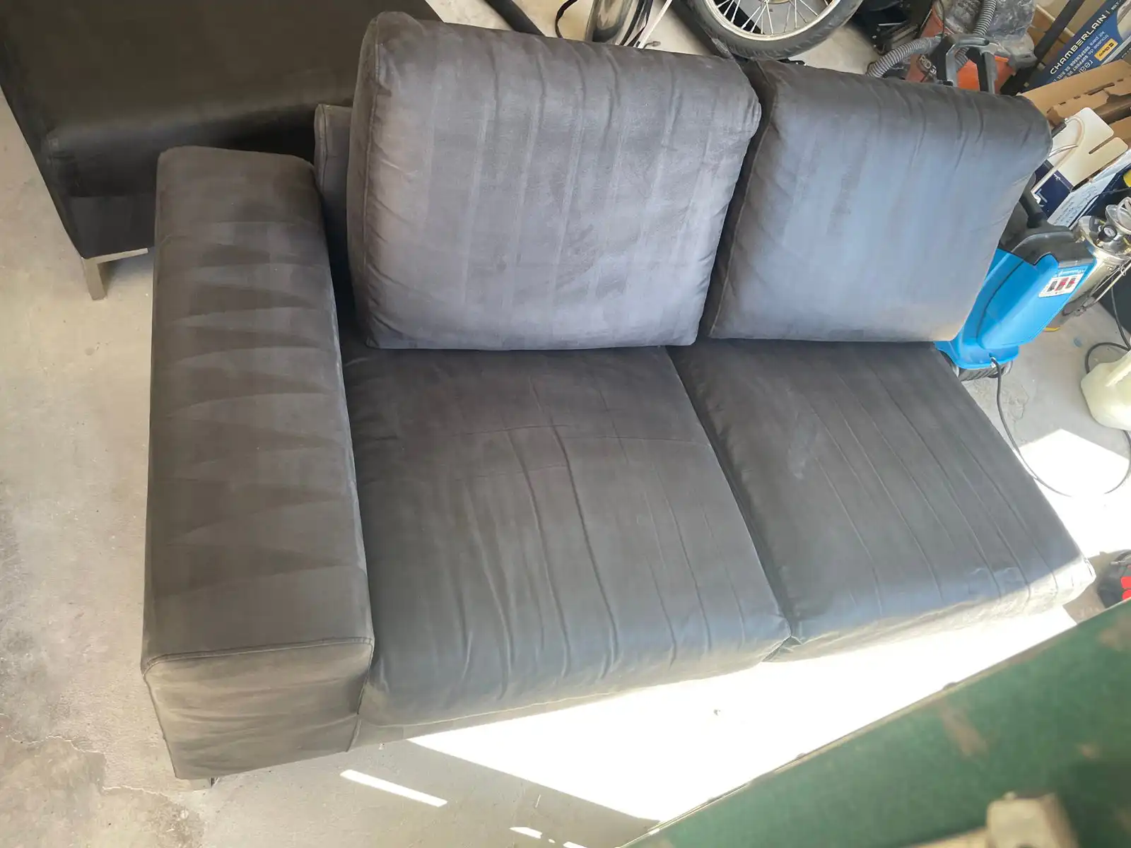 Before and after sofa cleaning in Buckeye garage storage grit and pet dander removed