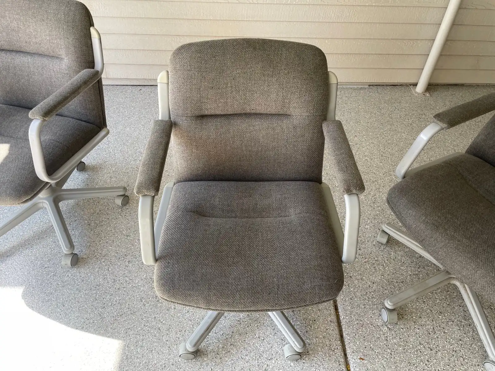 Before and after office chair cleaning in Buckeye pool home showing sunscreen compound soil removed