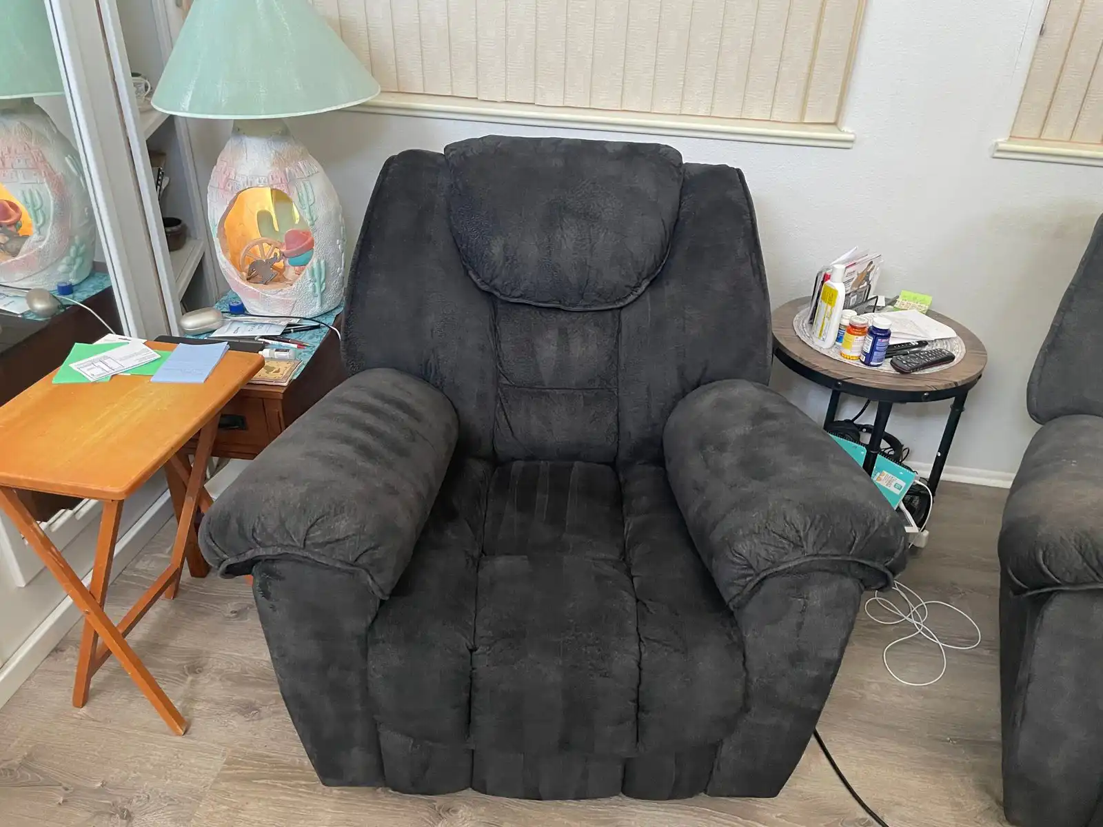 Before and after upholstery cleaning in Sun City showing oil and body soil removed