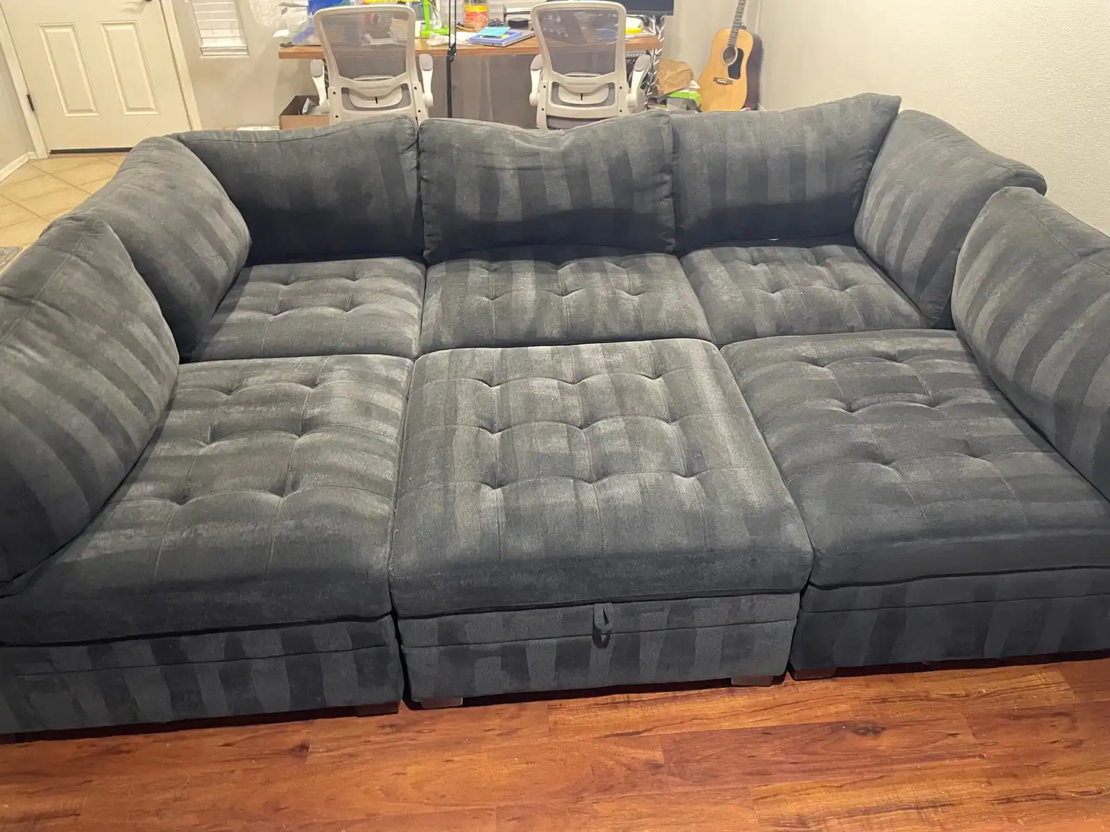 Before and after sofa cleaning in Youngtown home showing accumulated film removed